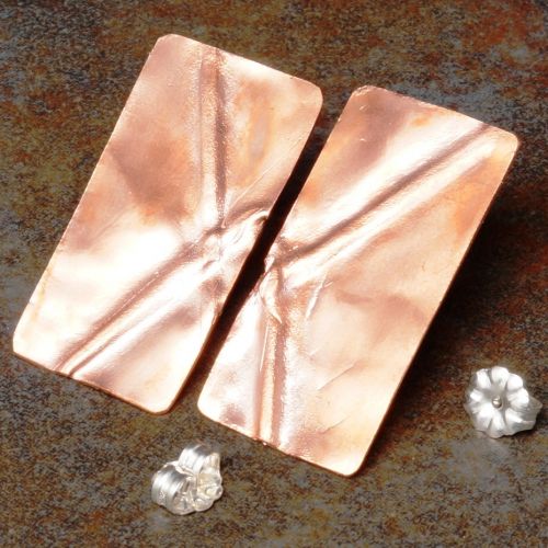 Handmade copper fold formed studs